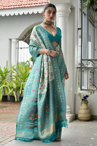 Green solid silk blend saree with blouse