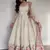 Cream Chinnon Silk Embroidery And Sirosky Work Party wear Gown