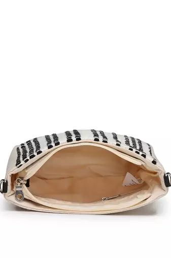 Anekaant earth edit off white & black jacquard striped sling bag