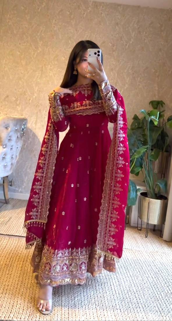 Rani-pink anarkali suit with embroidered sequins work