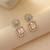 White color american diamond earrings