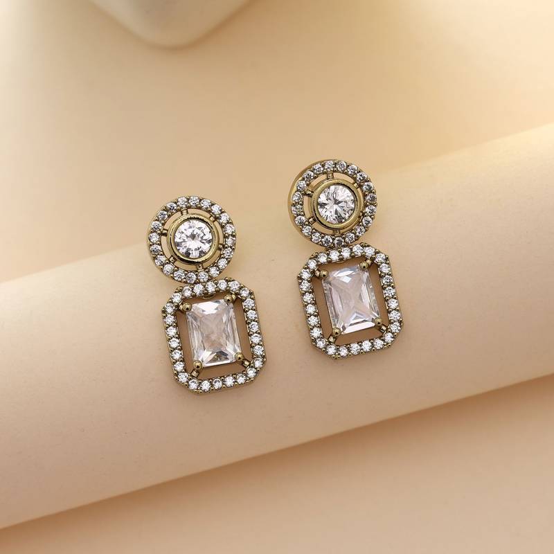 White color american diamond earrings