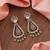 White color american diamond earrings