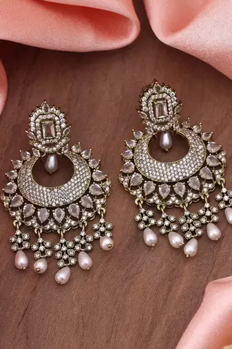 White color american diamond earrings