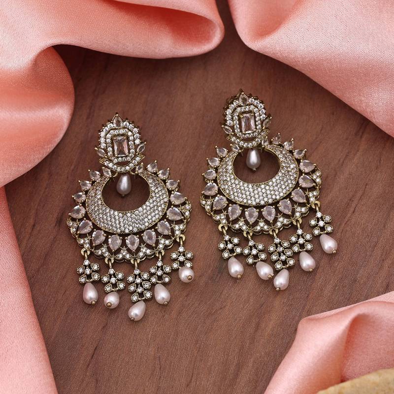 White color american diamond earrings