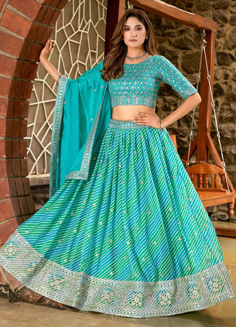 Turquoise Tabby Silk Print With Heavy Thread Embroidery Sequins Work Lehenga Choli
