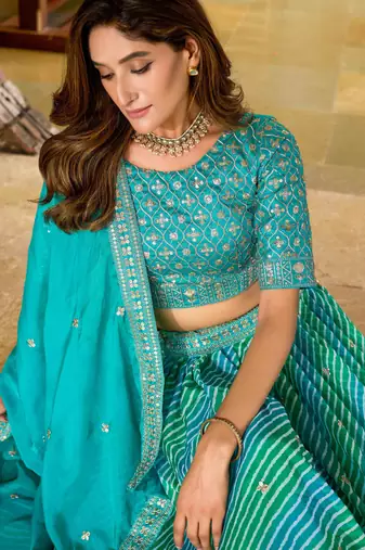 Turquoise Tabby Silk Print With Heavy Thread Embroidery Sequins Work Lehenga Choli