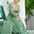 Elegant Green Floral Embroidered Silk Flared Gown With Dupatta