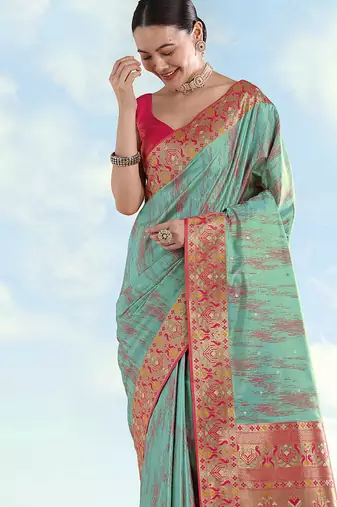 Sky blue color faux banarasi tissue silk blend paithani woven saree