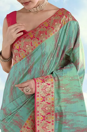 Sky blue color faux banarasi tissue silk blend paithani woven saree