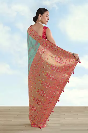 Sky blue color faux banarasi tissue silk blend paithani woven saree