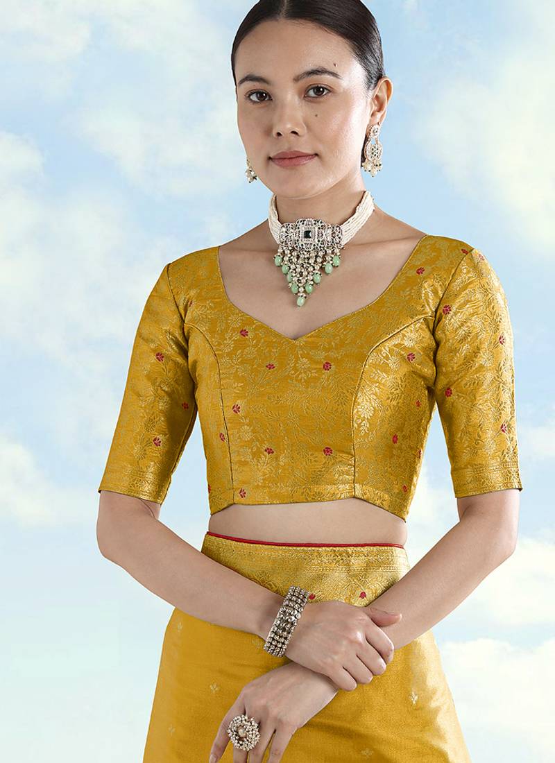 Mustard color paisley zari woven faux banarasi tissue silk saree