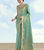 Light blue color paisley zari woven faux banarasi tissue silk saree