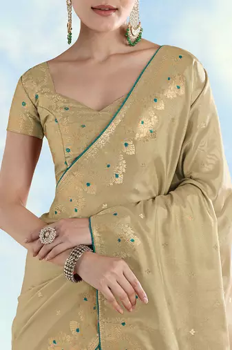 Cream color paisley zari woven faux banarasi tissue silk blend saree