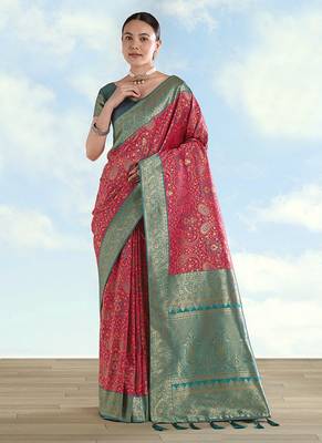 Rani pink faux banarasi silk blend saree with traditional paisley weaves 1