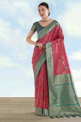Rani pink faux banarasi silk blend saree with traditional paisley weaves