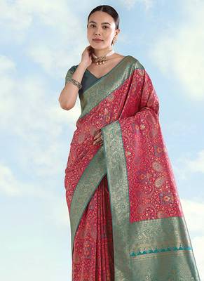 Rani pink faux banarasi silk blend saree with traditional paisley weaves 3