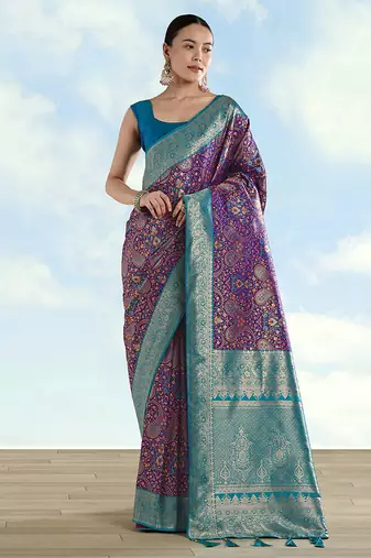 Purple faux banarasi silk blend saree with traditional paisley weaves