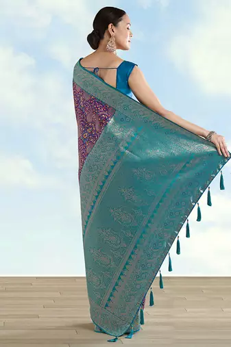 Purple faux banarasi silk blend saree with traditional paisley weaves