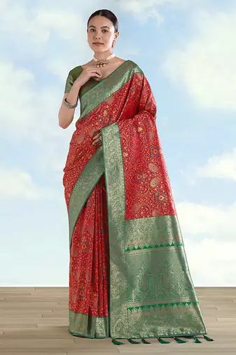 Red faux banarasi silk saree with traditional paisley weaves