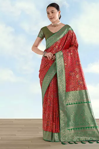 Red faux banarasi silk blend saree with traditional paisley weaves