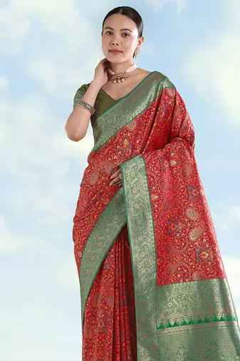 Red faux banarasi silk blend saree with traditional paisley weaves