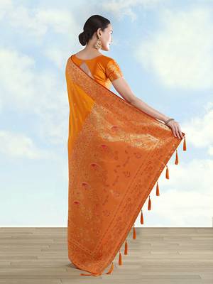 Orange faux banarasi satin silk blend saree with zari border and butti work 4