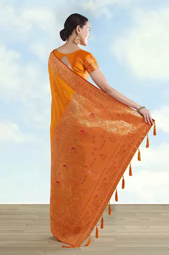 Orange faux banarasi satin silk blend saree with zari border and butti work