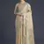 Cream faux banarasi satin silk saree with zari border and butti work