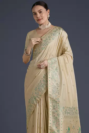 Cream faux banarasi satin silk blend saree with zari border and butti work