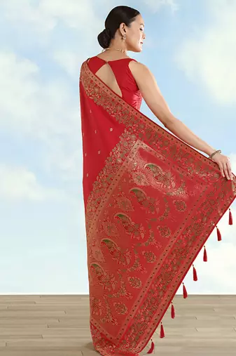 Red faux banarasi satin silk blend saree with zari border and butti work