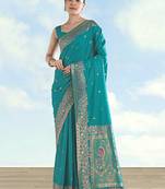 Turquoise faux banarasi satin silk saree with zari border and butti work