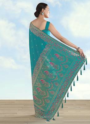 Turquoise faux banarasi satin silk blend saree with zari border and butti work 4