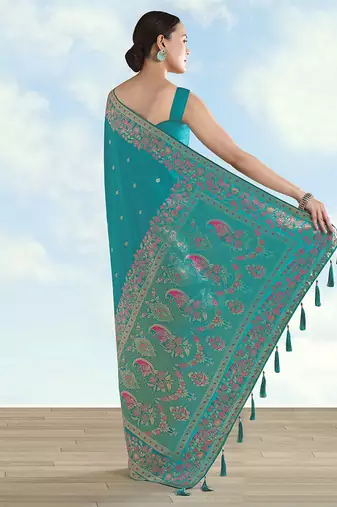 Turquoise faux banarasi satin silk blend saree with zari border and butti work