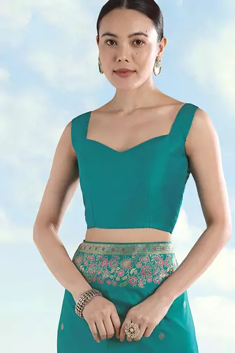 Turquoise faux banarasi satin silk blend saree with zari border and butti work