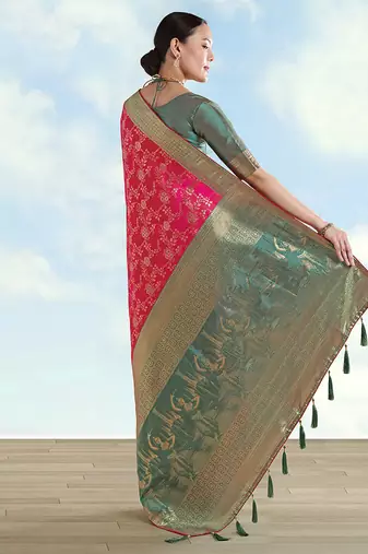 Rani pink faux banarasi silk blend saree with zari woven design