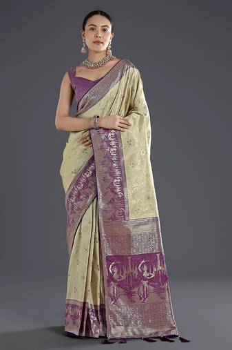 Cream faux banarasi silk saree with zari woven design