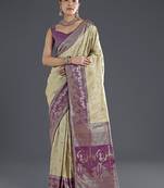 Cream faux banarasi silk saree with zari woven design