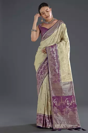 Cream faux banarasi silk blend saree with zari woven design