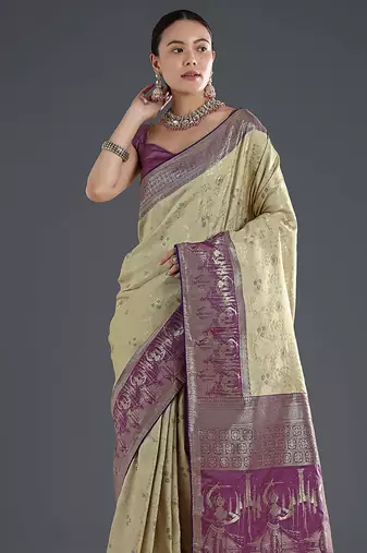 Cream faux banarasi silk blend saree with zari woven design