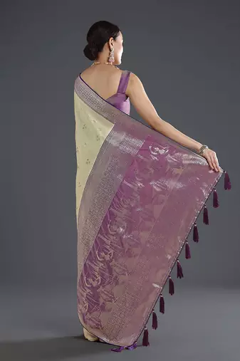 Cream faux banarasi silk blend saree with zari woven design