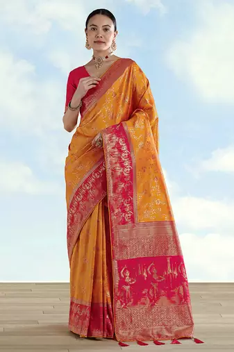 Orange faux banarasi silk saree with zari woven design