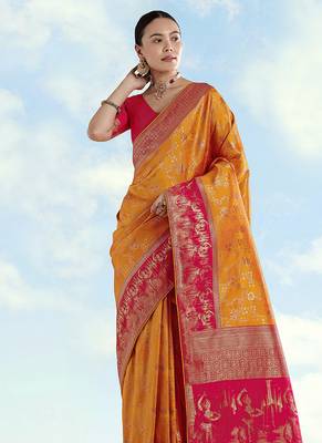 Orange faux banarasi silk blend saree with zari woven design 3