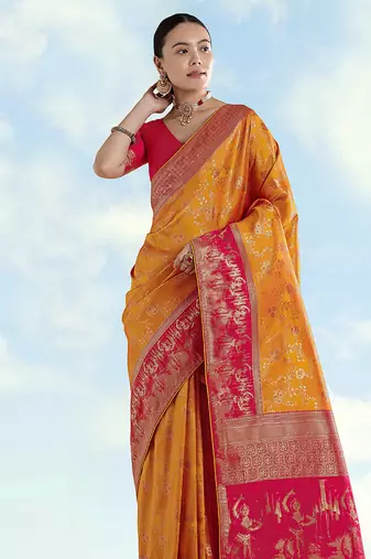 Orange faux banarasi silk blend saree with zari woven design