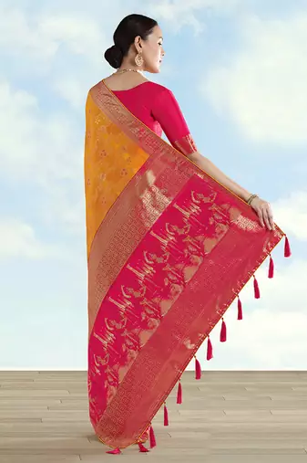 Orange faux banarasi silk blend saree with zari woven design