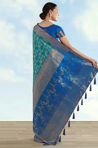 Turquoise faux banarasi silk blend saree with zari woven design