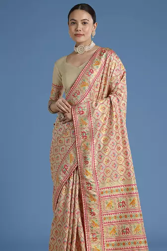 Cream faux banarasi satin silk blend saree with patola work