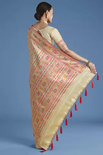 Cream faux banarasi satin silk blend saree with patola work