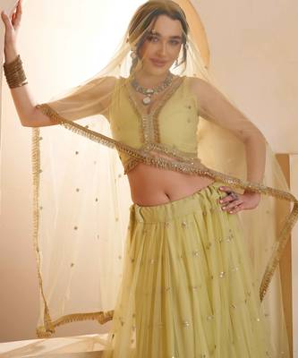 Lemon Yellow net sequin embroidered lehenga set with choli and dupatta 5