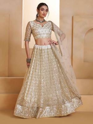 Off White net sequin embroidered lehenga set with choli and dupatta 1